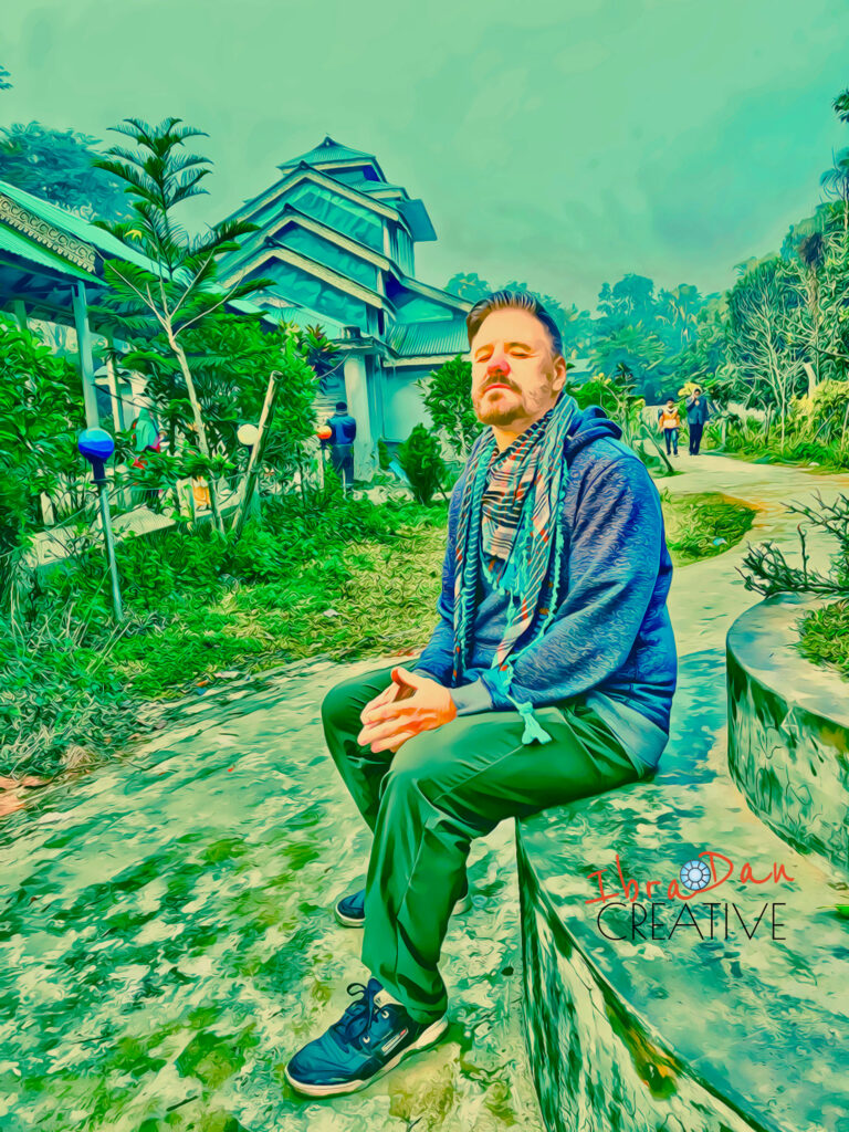 Daniel-Ibrahim visiting a Temple in Bangladesh and contemplating.