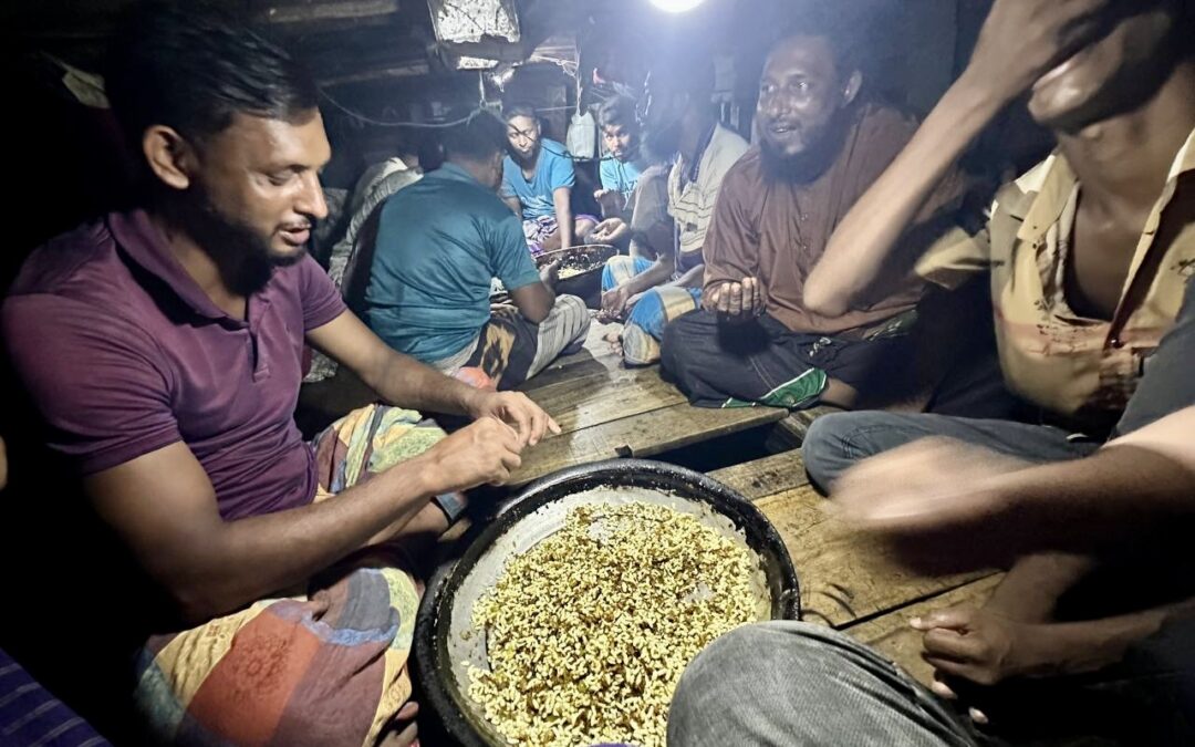B-Roll Bangladesh Fisherman -Dock Workers Enjoying Meal on a Wooden Sampan Boat